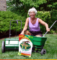 woman with granular repellent bag, rotary and drop spreaders